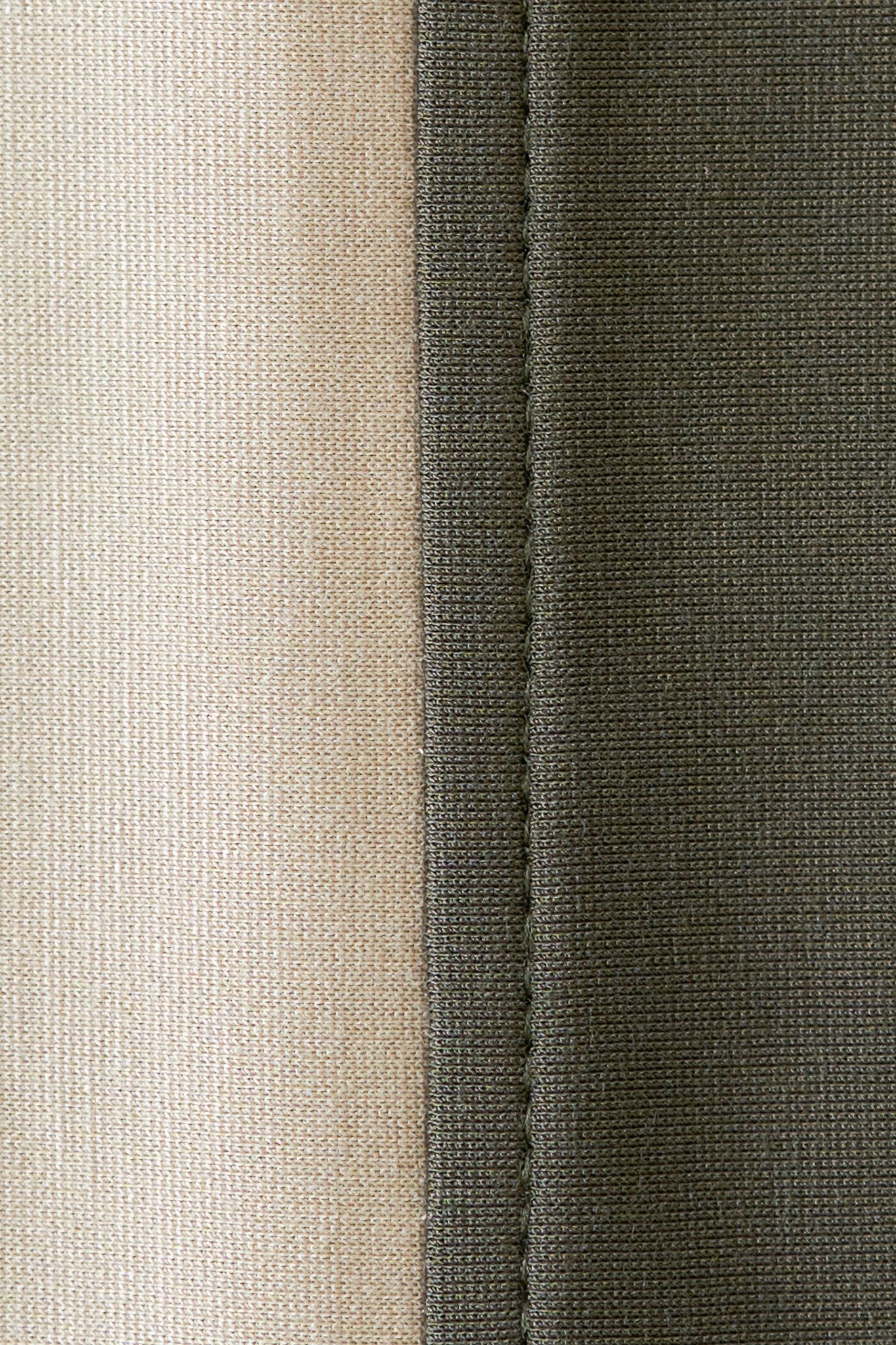 A close up of green and nude fabric