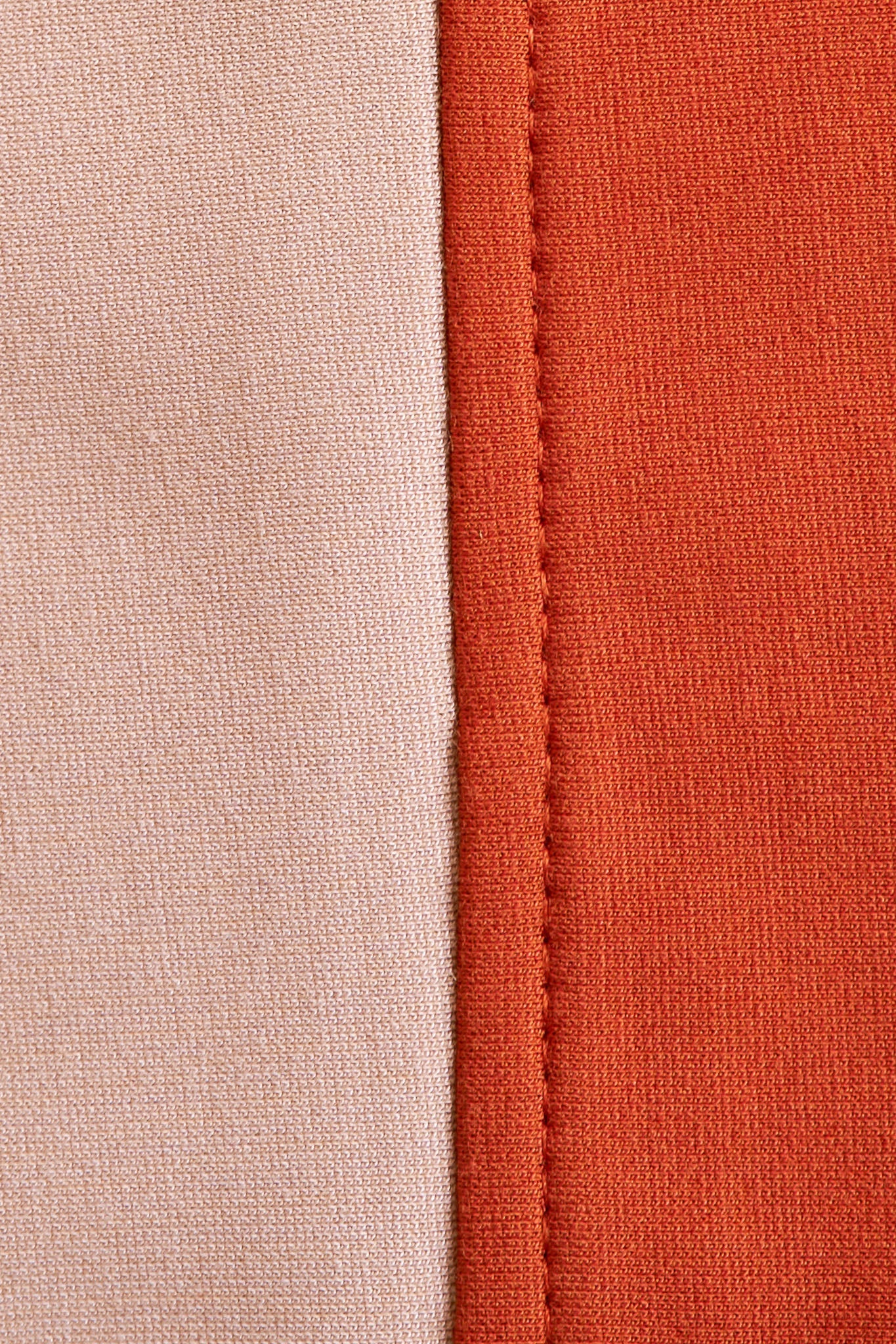 A close up of pink and nude fabric